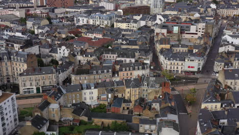 Aerial-shot-following-a-tramway-urban-area-avenue-général-leclerc-le-Mans-houses